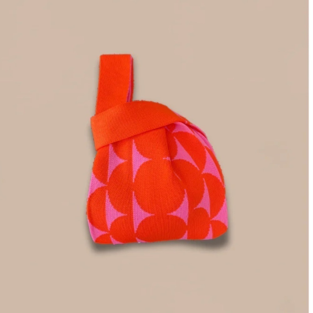 The B.O.D Board member Orange and Pink Knitted Handbag